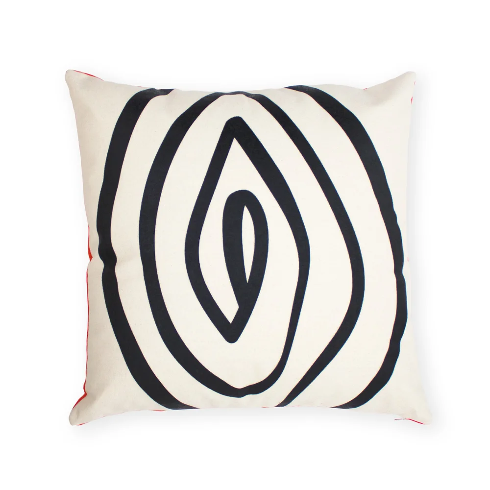 Square cream-colored pillow with a bold black spiral graphic and red trim, evoking a soft, cream-like texture